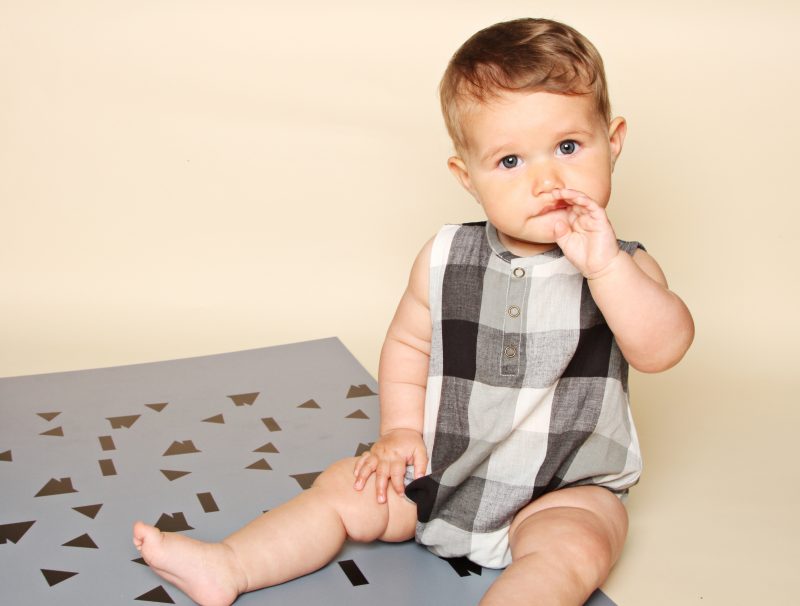 baby-boy-in-check-romper