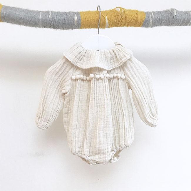 Pom pom spring romper cream-pom-pom-romper