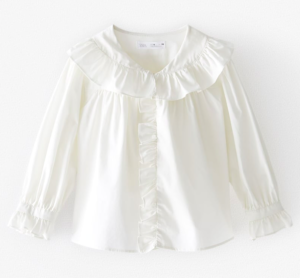 White ruffled shirt