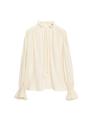 Cream ruffle neck-tie blouse