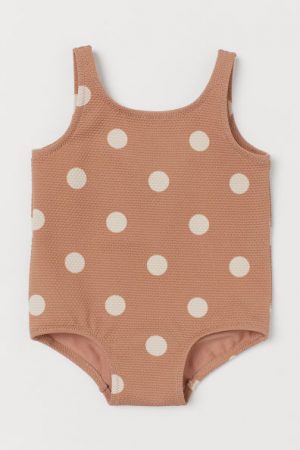 Polka dot textured baby swimsuit