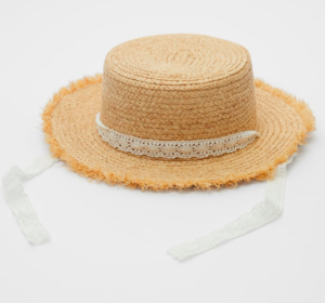 Straw hat with frayed ribbon