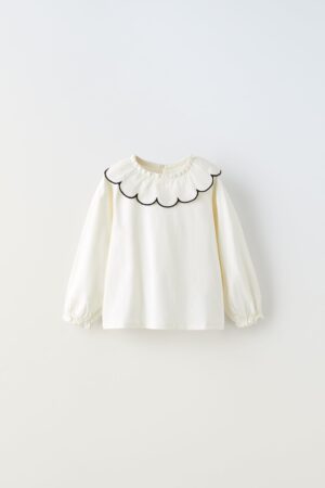 cream blouse bib collar