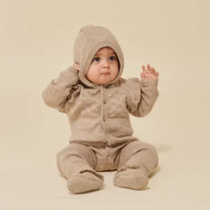beige hooded knitted baby onesie