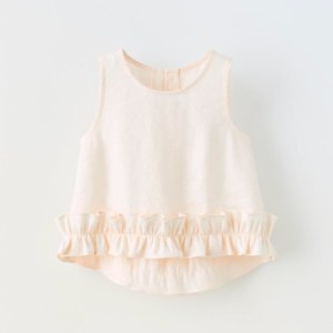 cream ruffled kids top