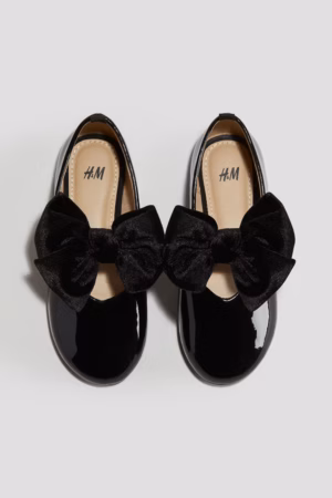 black patent bow pumps