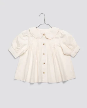 cream blouse